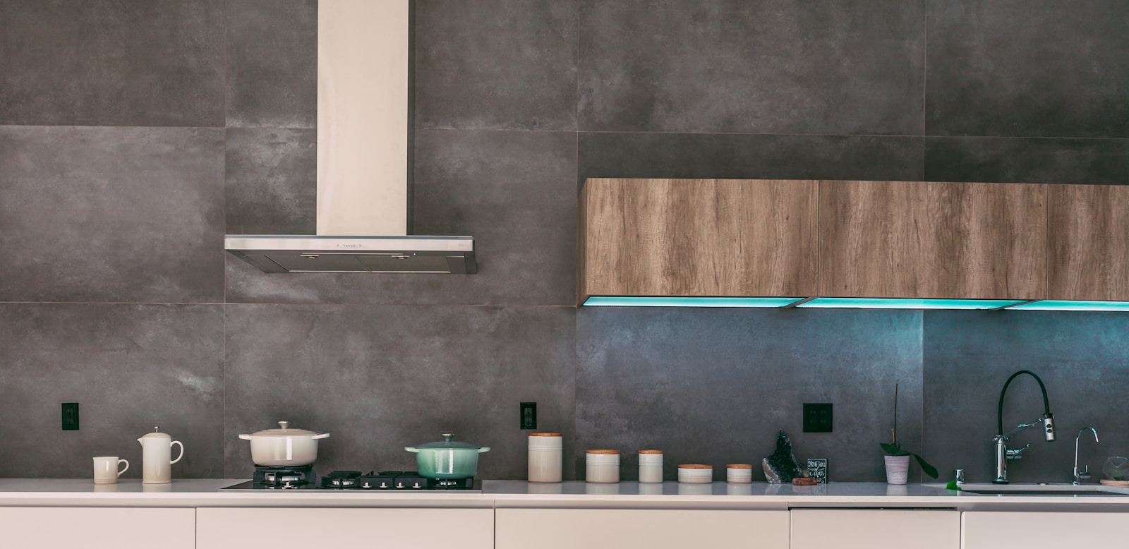 Thermador range hood with LED lighting in modern kitchen